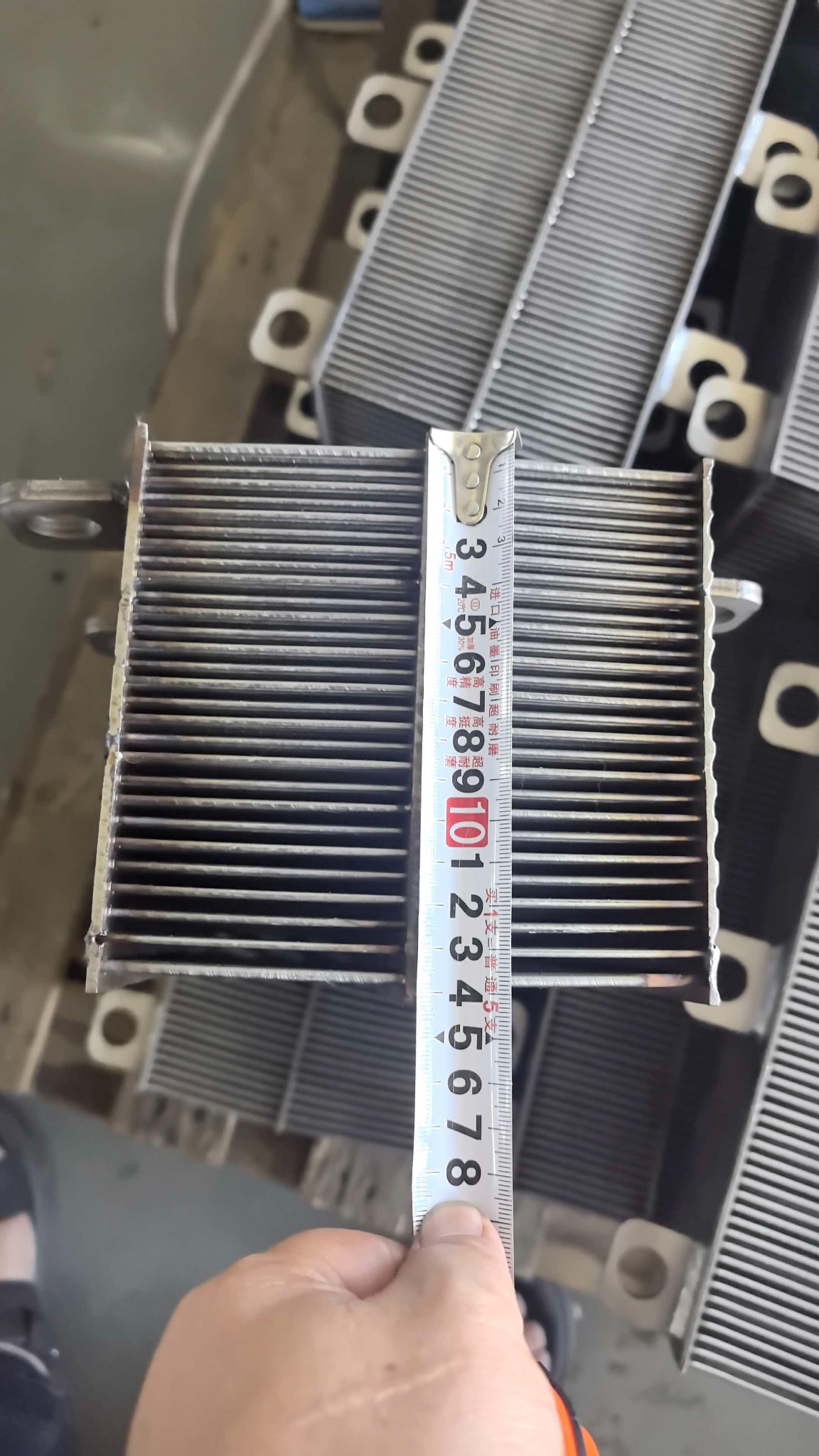 Tape measure showing the body depth of a matrix box