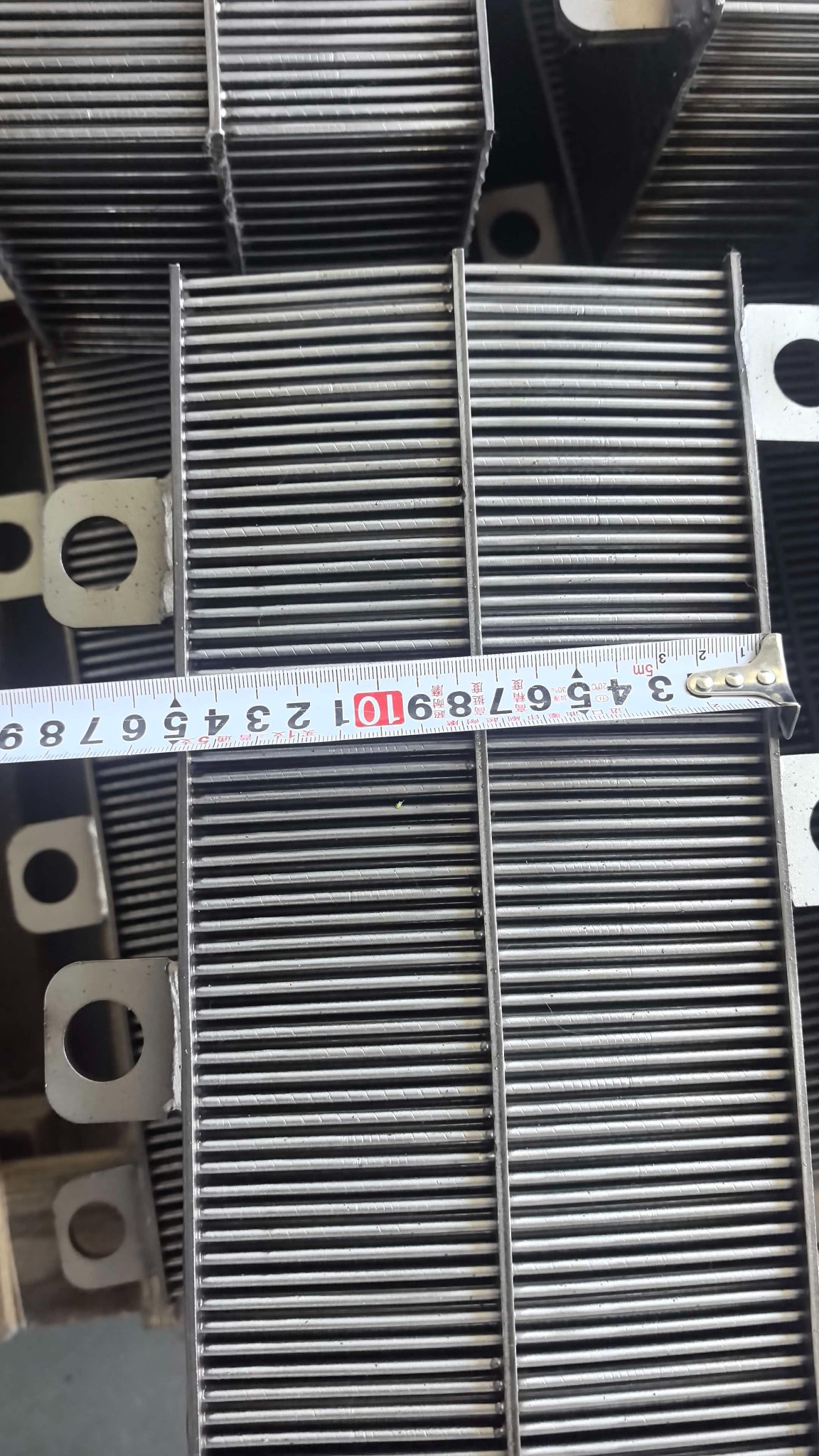 Tape measure aligned across the overall width of a matrix box